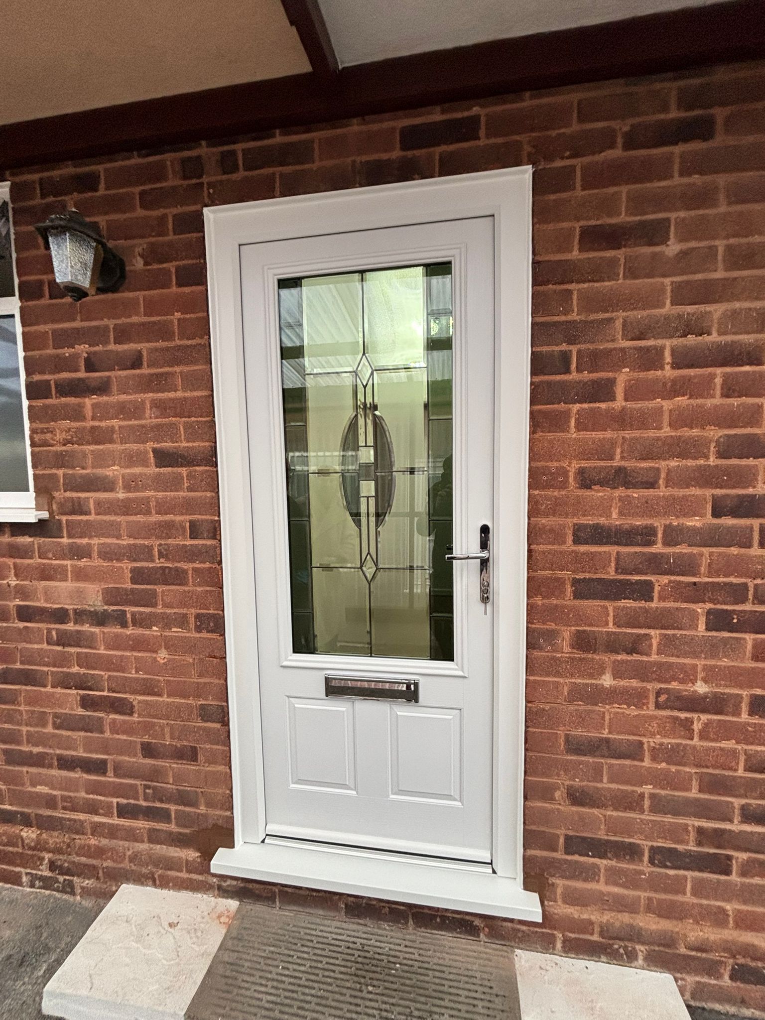 White UPVC Door with Decorative Glass Panel